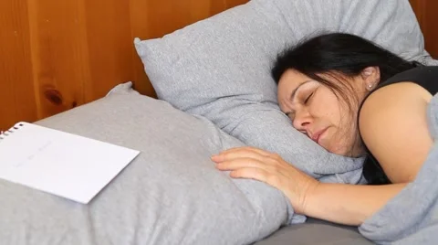 Goodbye letter in bed Stock Footage 60968848