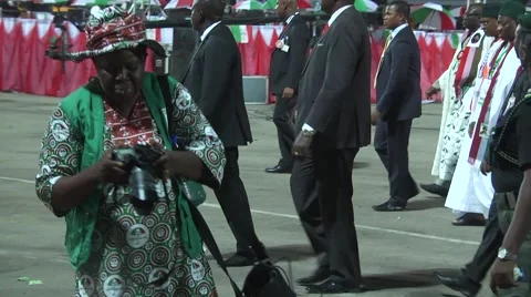 Goodluck Jonathan Walks past Stock Footage 58022010