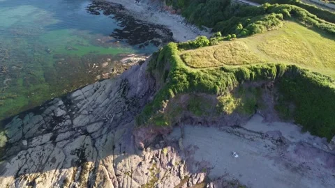 Goodrington, Devon, England: DRONE VIEWS: Oyster Cove, Saltern Cove &amp; Sugar Hill Stock Footage 223857395