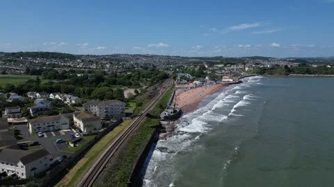 Goodrington, Devon, England: DRONE VIEWS: Goodrington Sands &amp; Holidaymakers Stock Footage 242615641