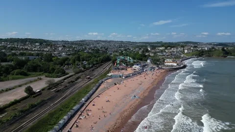 Goodrington, Devon, England: DRONE VIEWS: Goodrington Sands &amp; Holidaymakers Stock Footage 242615648