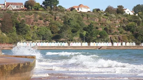 Goodrington Sands, Devon: Slow motion of waves crashing into shore (NO AUDIO) Stock Footage 116443863