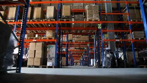 Goods and materials arranged on a rack in warehouse. Stock Footage 199014221