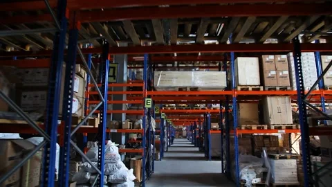 Goods and materials arranged on a rack in warehouse. Stock Footage 199014252