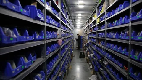 Goods and materials arranged on a rack in warehouse. Stock Footage 199014425