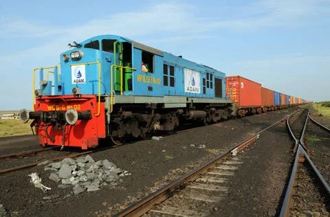 Goods containers with train engine at Adani Power ; Mundra ; Kutch ; Gujar... Foto stock