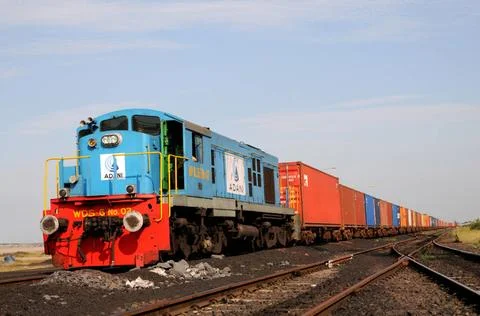 Goods containers with train engine at Adani Power ; Mundra ; Kutch ; Gujar... Foto stock