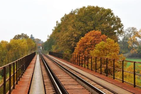 Goods train on the railway bridge Stock Photos
