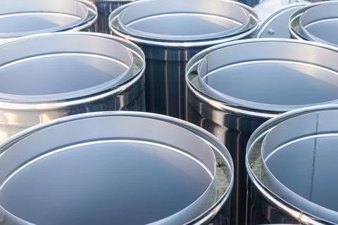 Goods in the warehouse. Shiny modules or fragments of stainless steel pipes f 스톡 사진