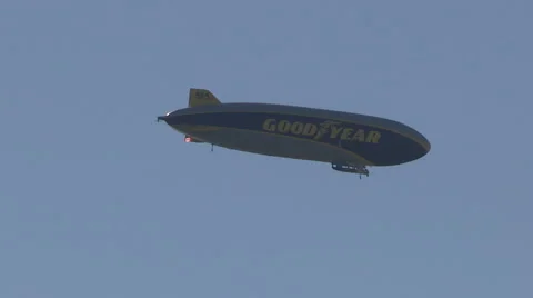 Goodyear blimp flying above Toronto downtown Stock Footage
