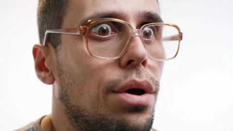 Goofy Glasses Guy with Exaggerated Shock Face 스톡 동영상 312474998