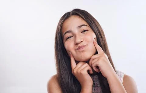 Goofy is my middle name. Cropped portrait of an attractive teenage girl standing Stock Photos
