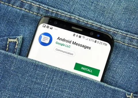 Google Android Message on a phone screen in a pocket Stock Photos