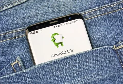 Google Android OS on a phone screen in a pocket Stock Photos