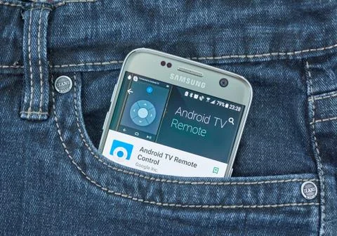 Google Android TV remote mobile application on screen of Samsung Stock Photos