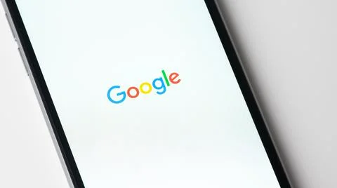 Google app launching on Apple iPhone Foto stock