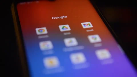 Google application on the mobile phone dispplay. google icon app on phone. 스톡 동영상 232684586