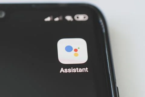 Google Assistant logo on smartphone. April 8, 2021, Barnaul, Russia Stock Photos