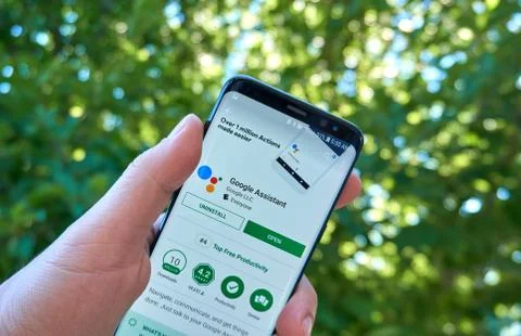 Google Assistant mobile app on Samsung s8. Stock Photos
