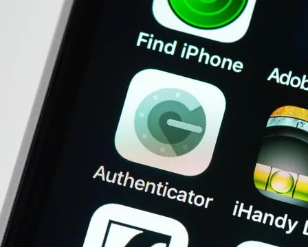 Google Authenticator app icon on Apple iPhone screen Stock Photos