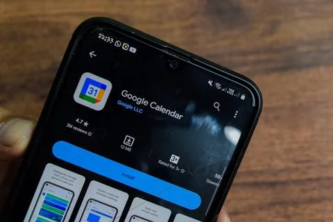 Google Calendar application on Smartphone screen. Photos