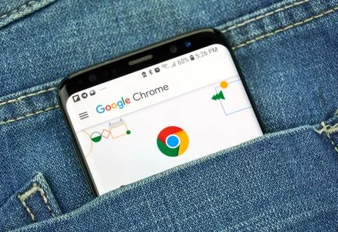 Google Chrome on a phone screen in a pocket Fotos Stock