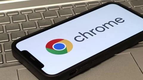 Google Chrome web browser logo displayed on mobile phone Stock Footage 324705206