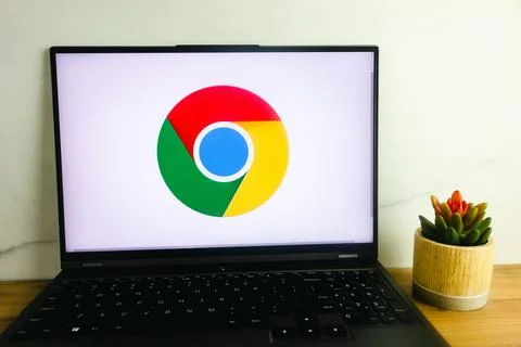 Google Chrome web browser logo displayed on laptop Stock Photos
