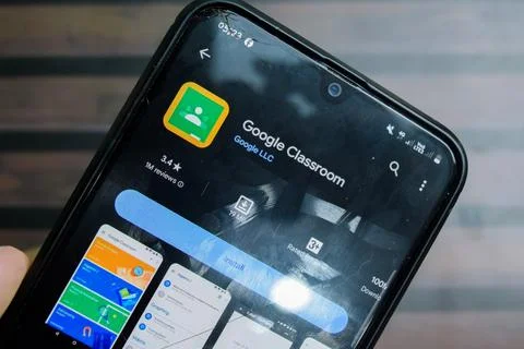 Google Classroom application on Smartphone screen. Photos
