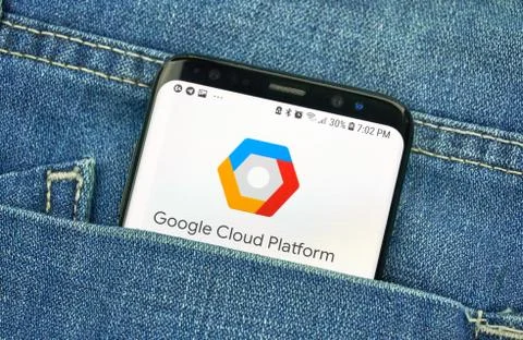 Google Cloud Platform on a phone screen in a pocket Stock Photos