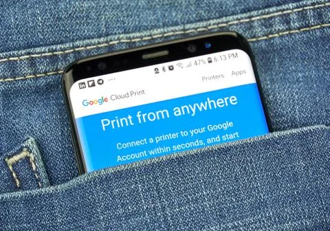 Google Cloud Print on a phone screen in a pocket Photos