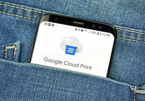 Google Cloud Print on a phone screen in a pocket Фото