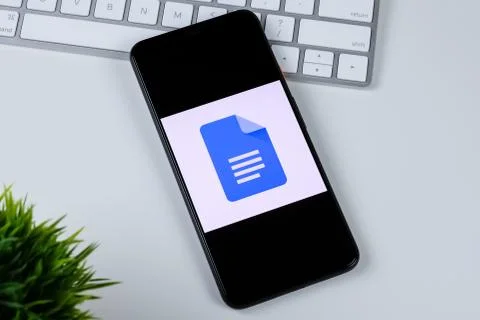 Google Docs app logo on a smartphone screen Stock Photos