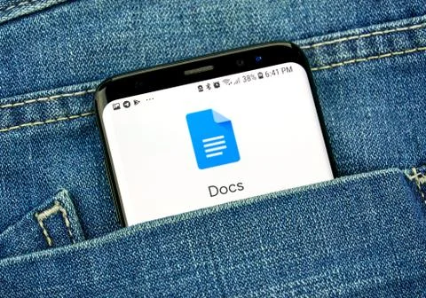 Google Docs app on a phone screen in a pocket Fotos de archivo