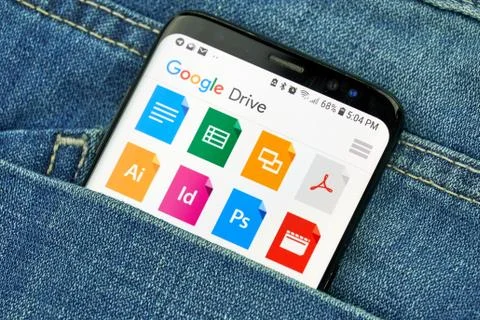 Google Drive app on a phone screen in a pocket Fotos Stock