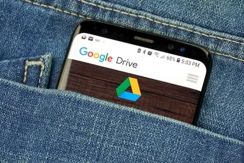 Google Drive app on a phone screen in a pocket Фото