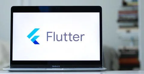 The Google Flutter logo on a Laptop Screen Stock Photos