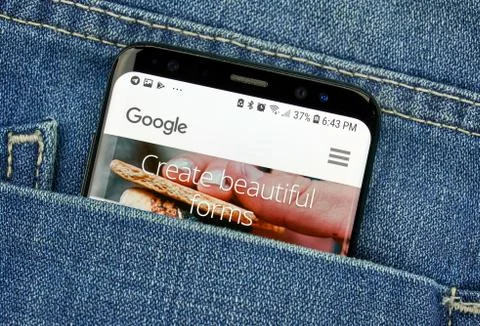 Google Forms on a phone screen in a pocket Fotos Stock