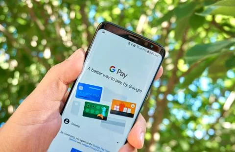 Google G Pay mobile app on Samsung s8. Stock Photos