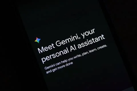 Google Gemini AI Assistant Introduction - Dark Interface with Colorful Logo Stock Photos