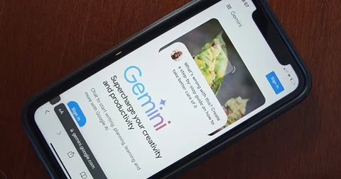 Google Gemini website seen in an iPhone screen Stock Footage 264933758