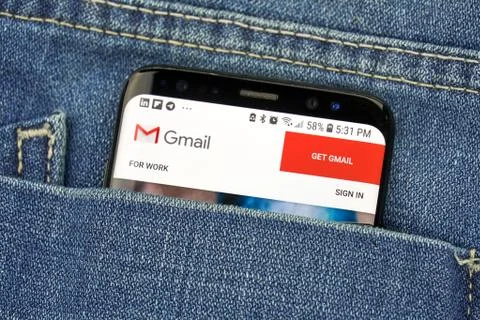 Google Gmail on a phone screen in a pocket Fotos Stock
