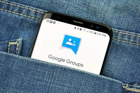 Google Groups app on a phone screen in a pocket Fotos de archivo