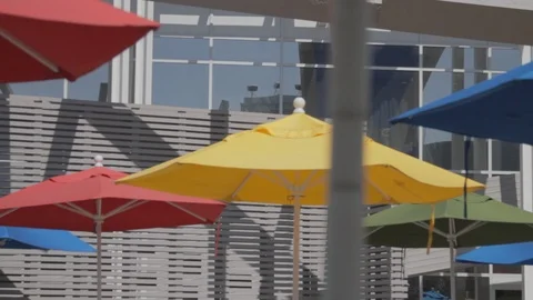 Google Headquarters - Umbrellas in the Courtyard with Google logo (pan right) Stock Footage 96001190