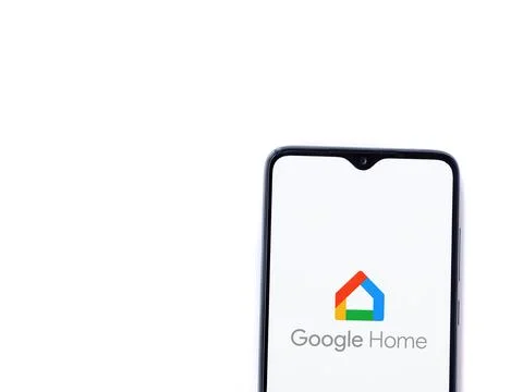 Google Home app launch screen on smartphone on white background Stock Photos
