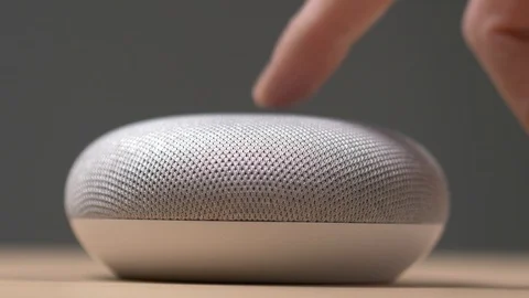 Google Home Mini Voice Activated Assistant in Use Stock Footage 101552826