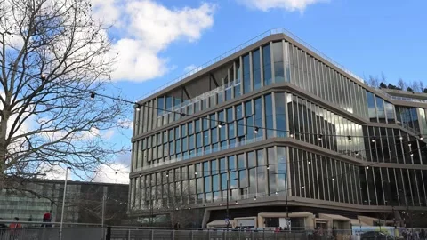 Google HQ Landscraper and Granary Square Footbridge London Stock Footage 330840716