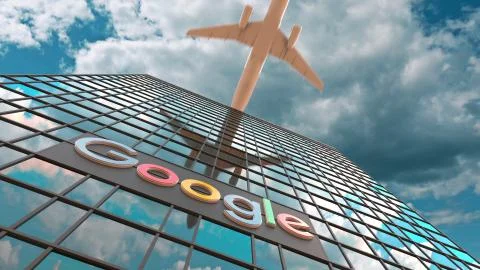 Google logo on a modern skyscraper reflecting clouds and flying airplane Ilustración de archivo