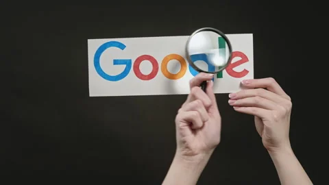 Google logo search engine hand magnifying glass Stock Footage 134888924