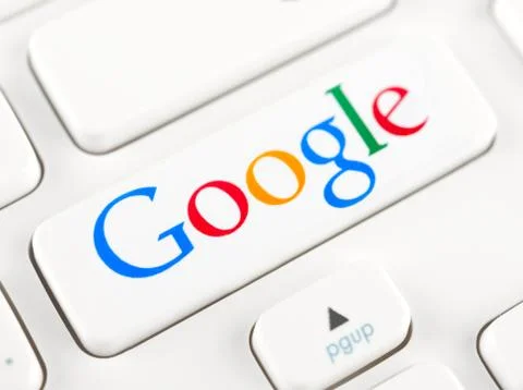 Google logotype on a keyboard button Foto stock